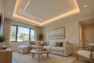 Living room with a tray border and two offset LED lines above the seating area